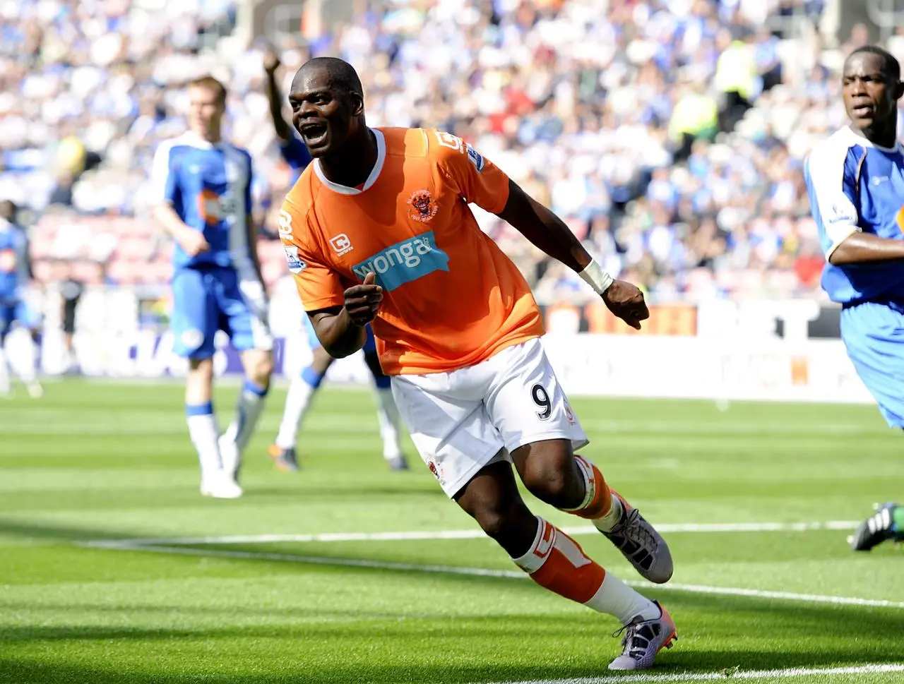 Marlon Harewood celebrates his second goal in Blackpool's 4-0 win against Wigan 