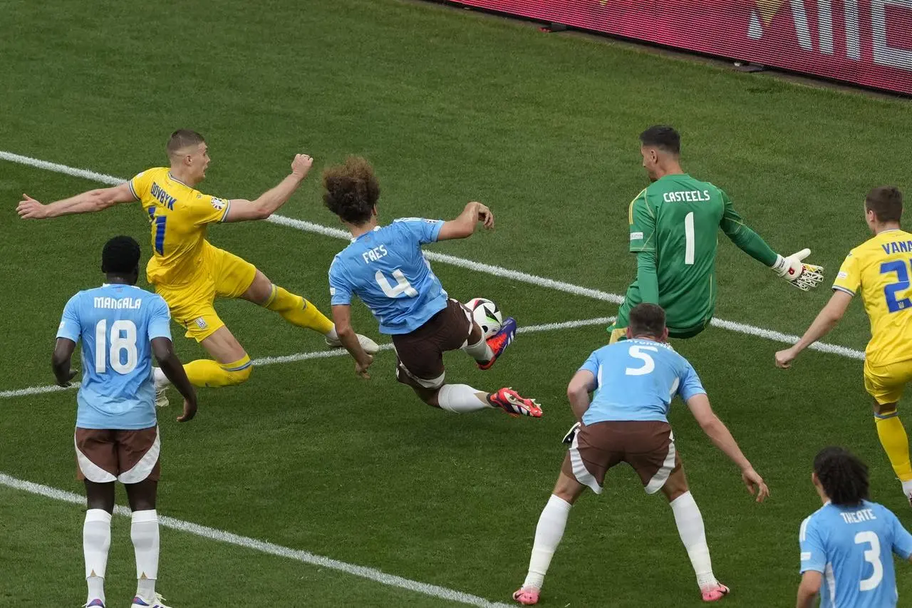 Ukraine’s Artem Dovbyk makes an attempt to score