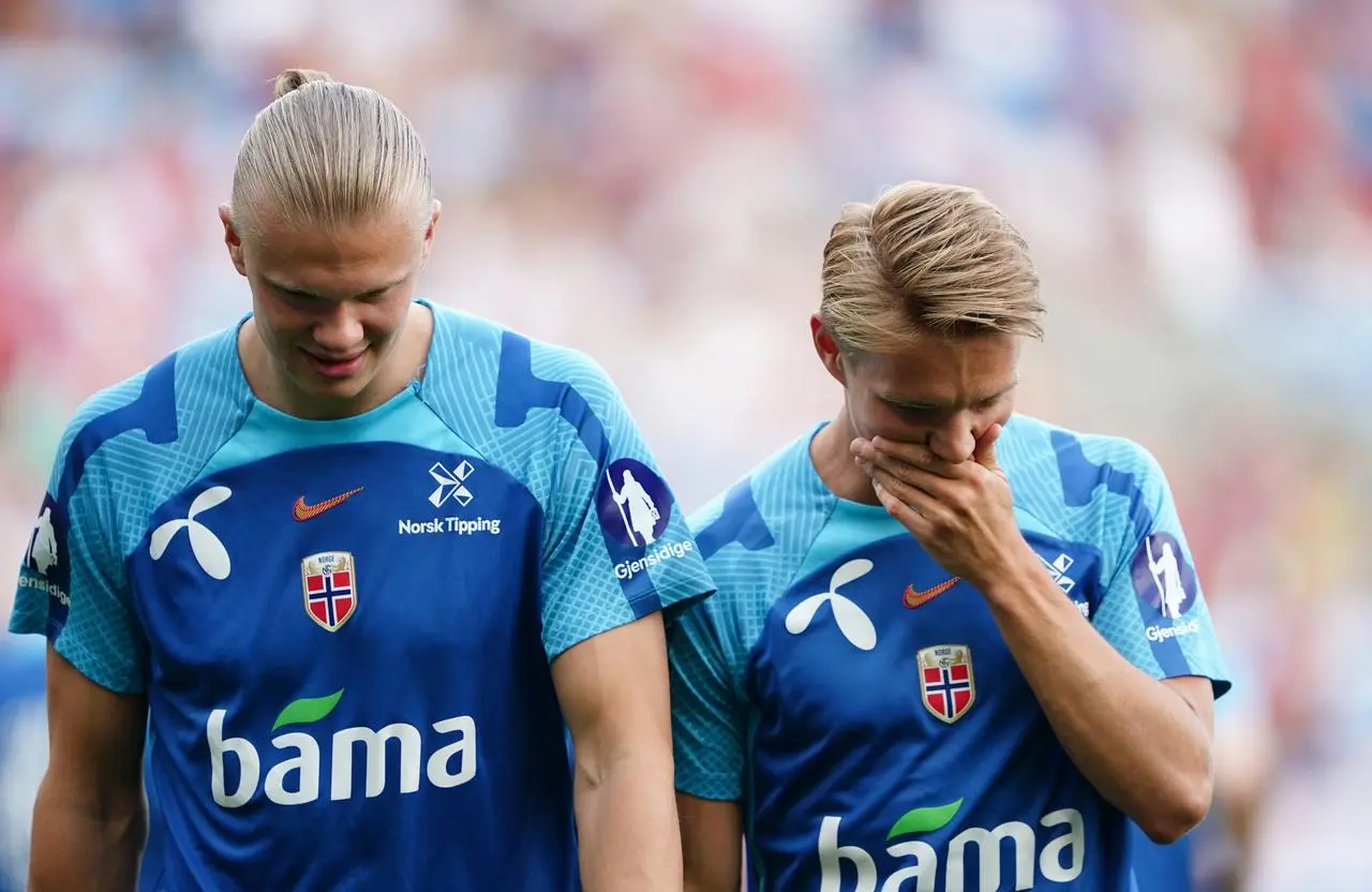 Premier League pair Erling Haaland (left) and Martin Odegaard will not be at the Euros after Norway failed to qualify