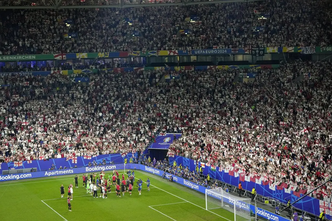 Georgia celebrate reaching the last 16 at Euro 2024 after producing a major upset by beating Portugal 2-0