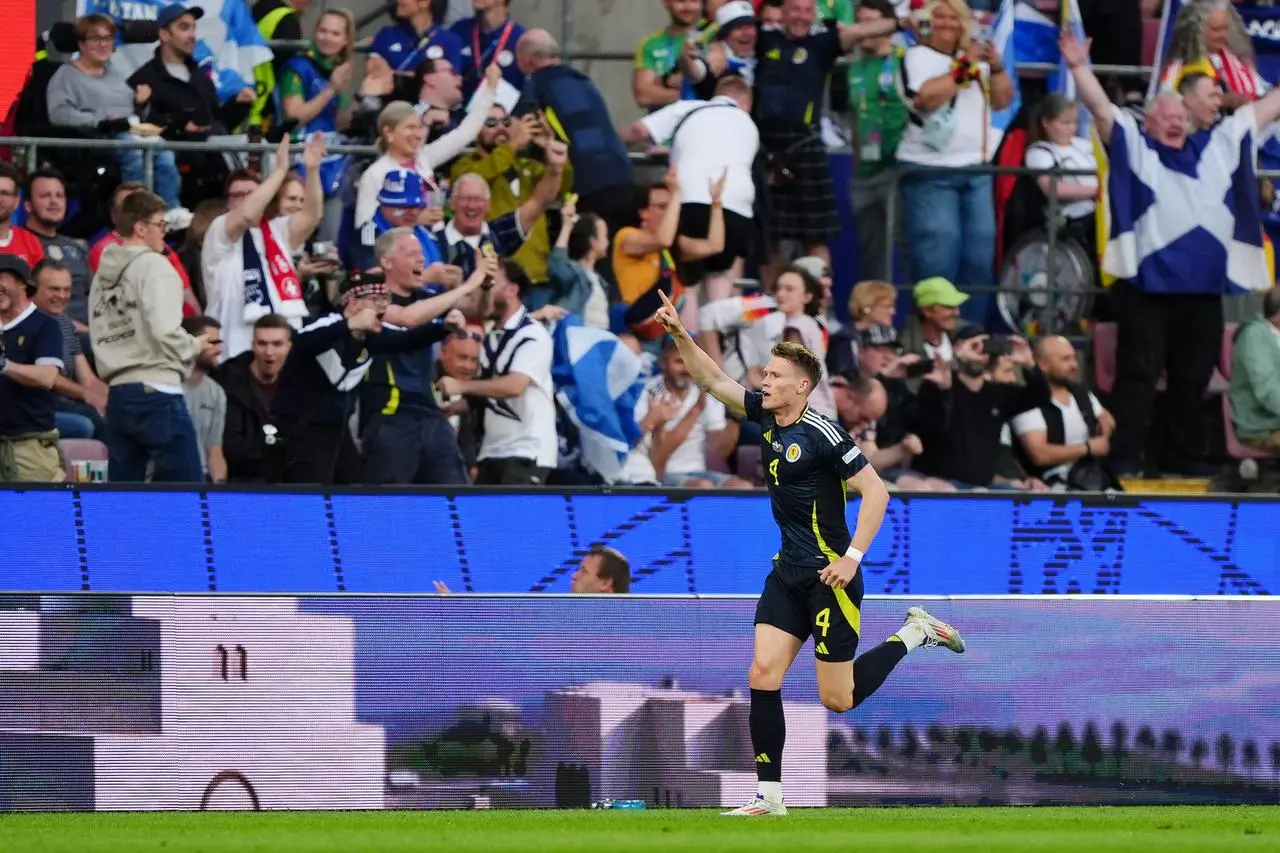 Scotland midfielder Scott McTominay celebrates after scoring the opening goal in his side's 1-1 Group A draw with Switzerland in Cologne