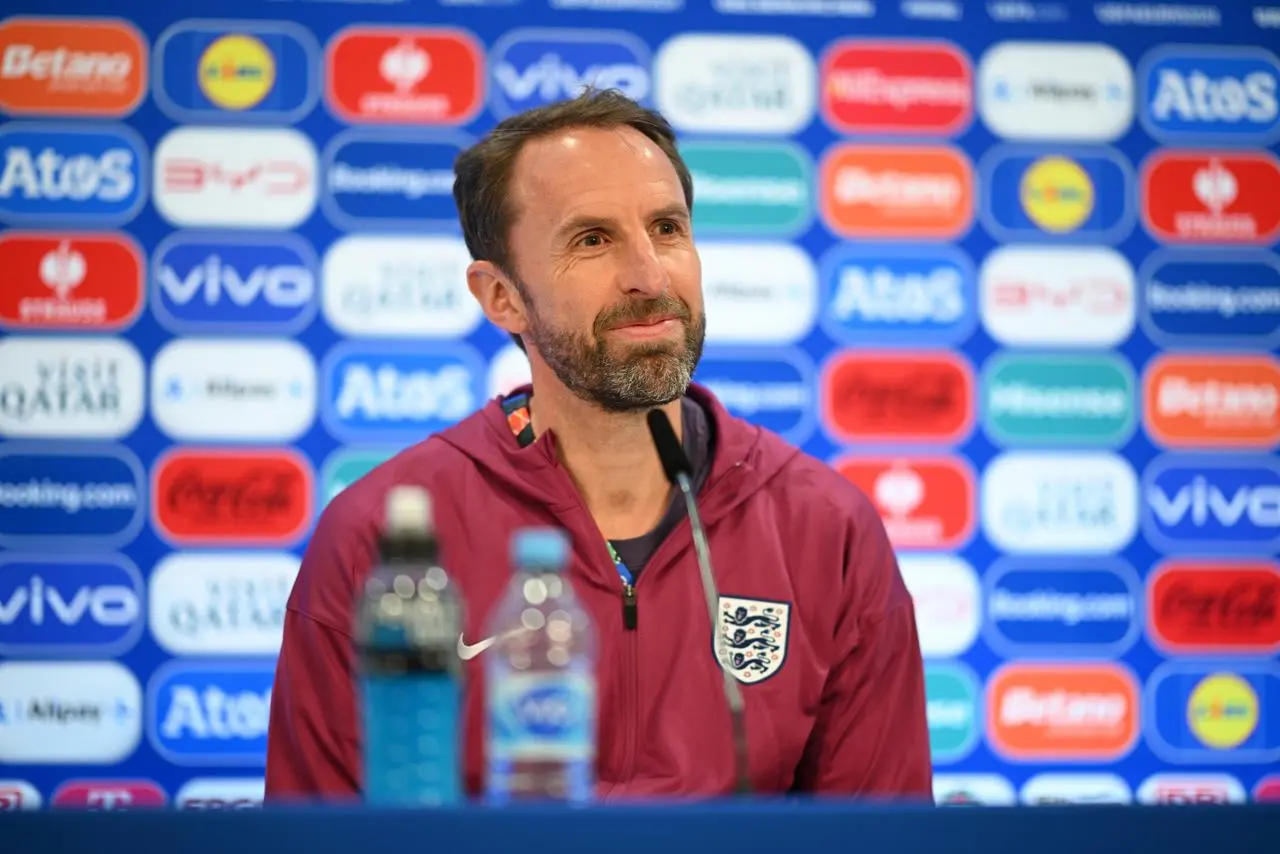 England manager Gareth Southgate smiles as he fields questions from the media