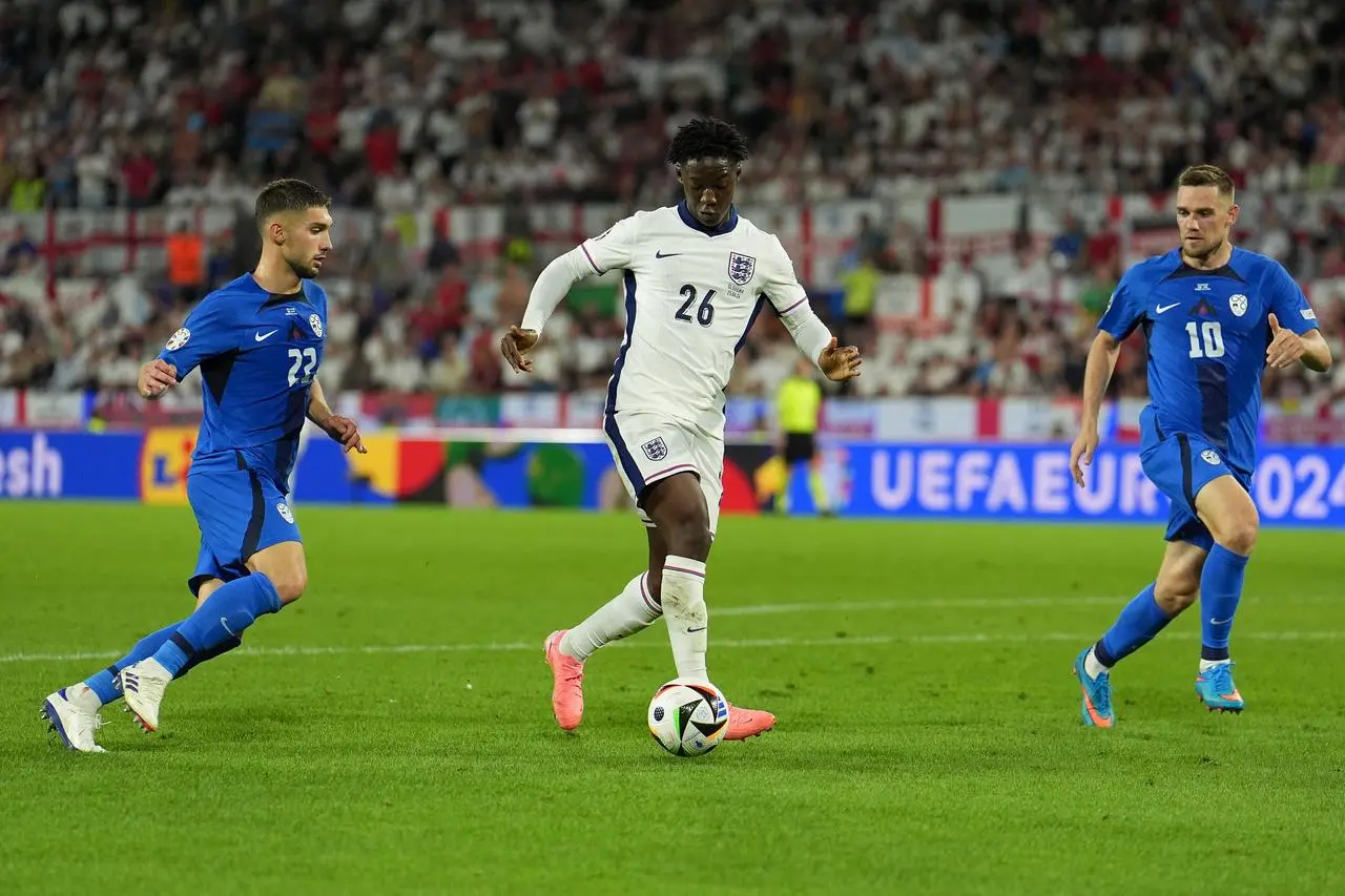 England’s Kobbie Mainoo (centre) in action against Slovenia at Euro 2024