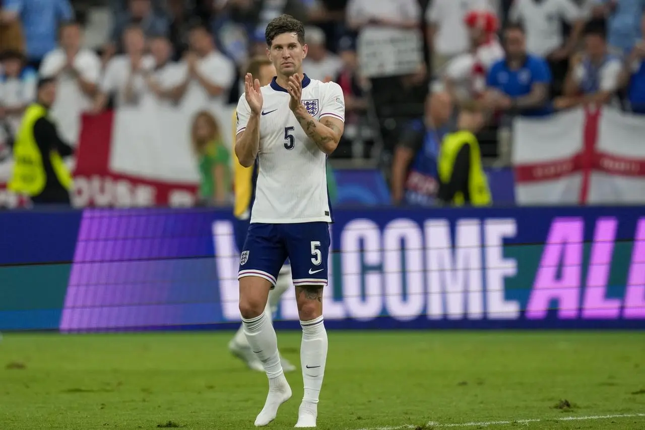 England’s John Stones acknowledges supporters at the end the draw (against Denmark