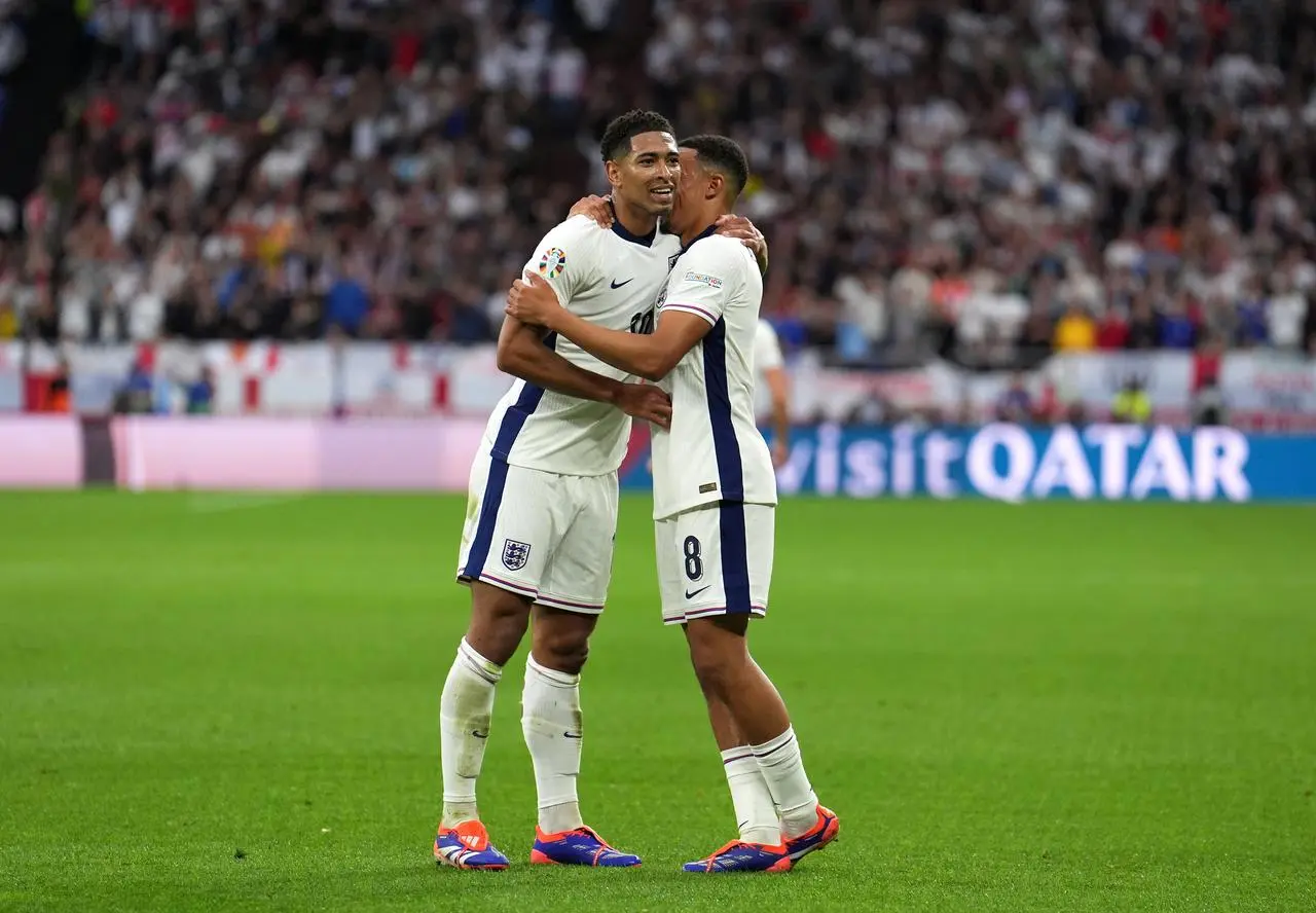 Jude Bellingham (left) celebrates scoring with Trent Alexander-Arnold 