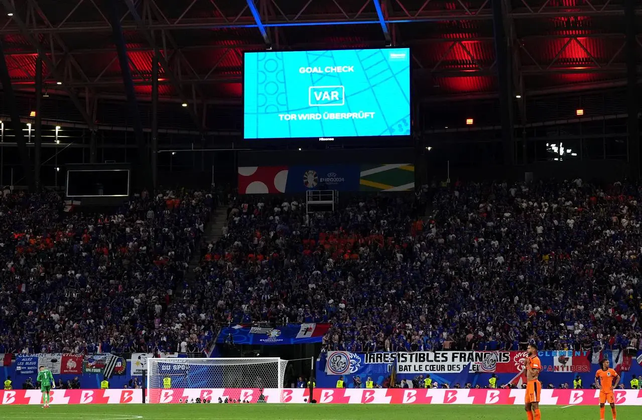 A large screen showing a VAR check which ruled out Xavi Simons' strike in the second half for the Netherlands