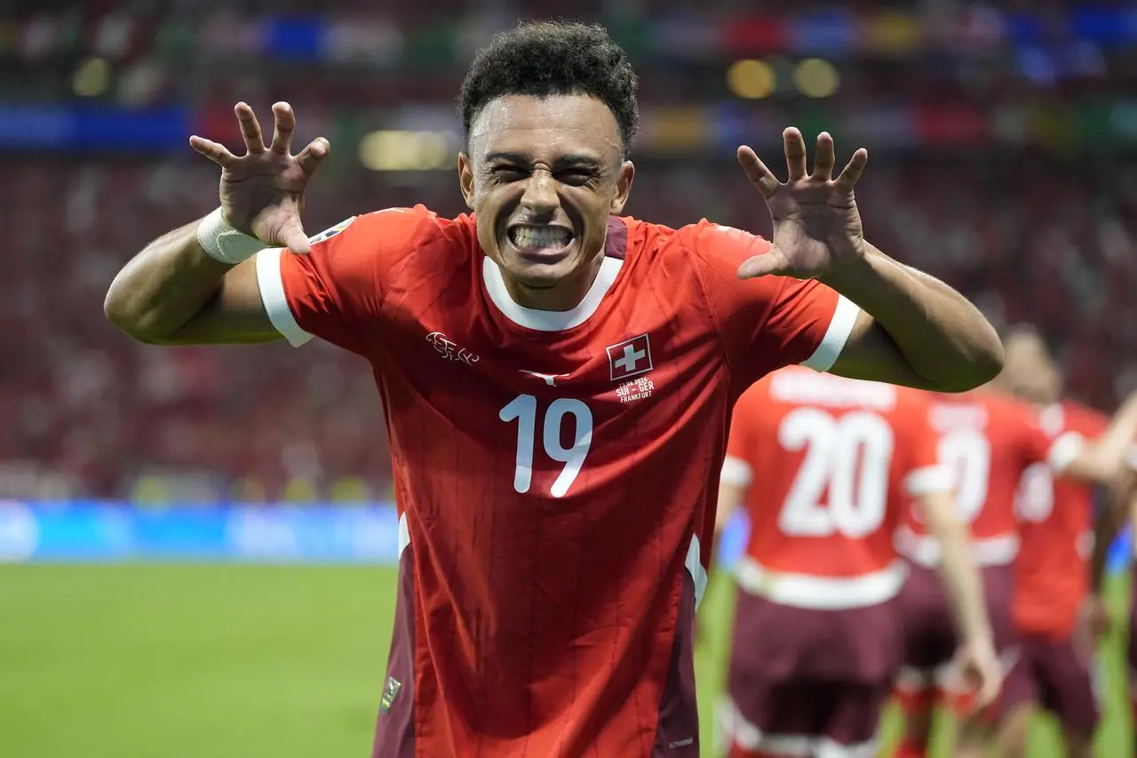 Dan Ndoye celebrates scoring Switzerland's goal 