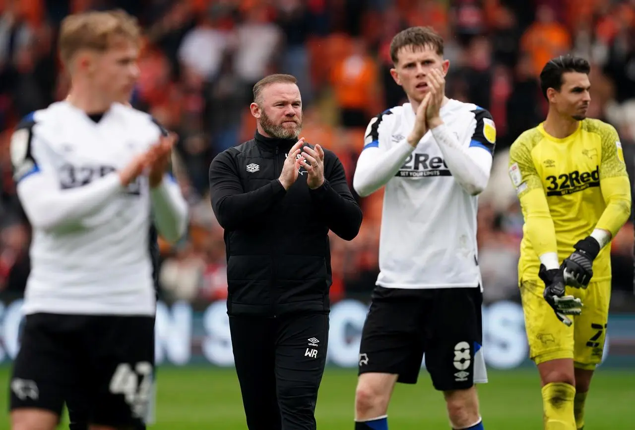 Rooney and his derby players clap the fans 