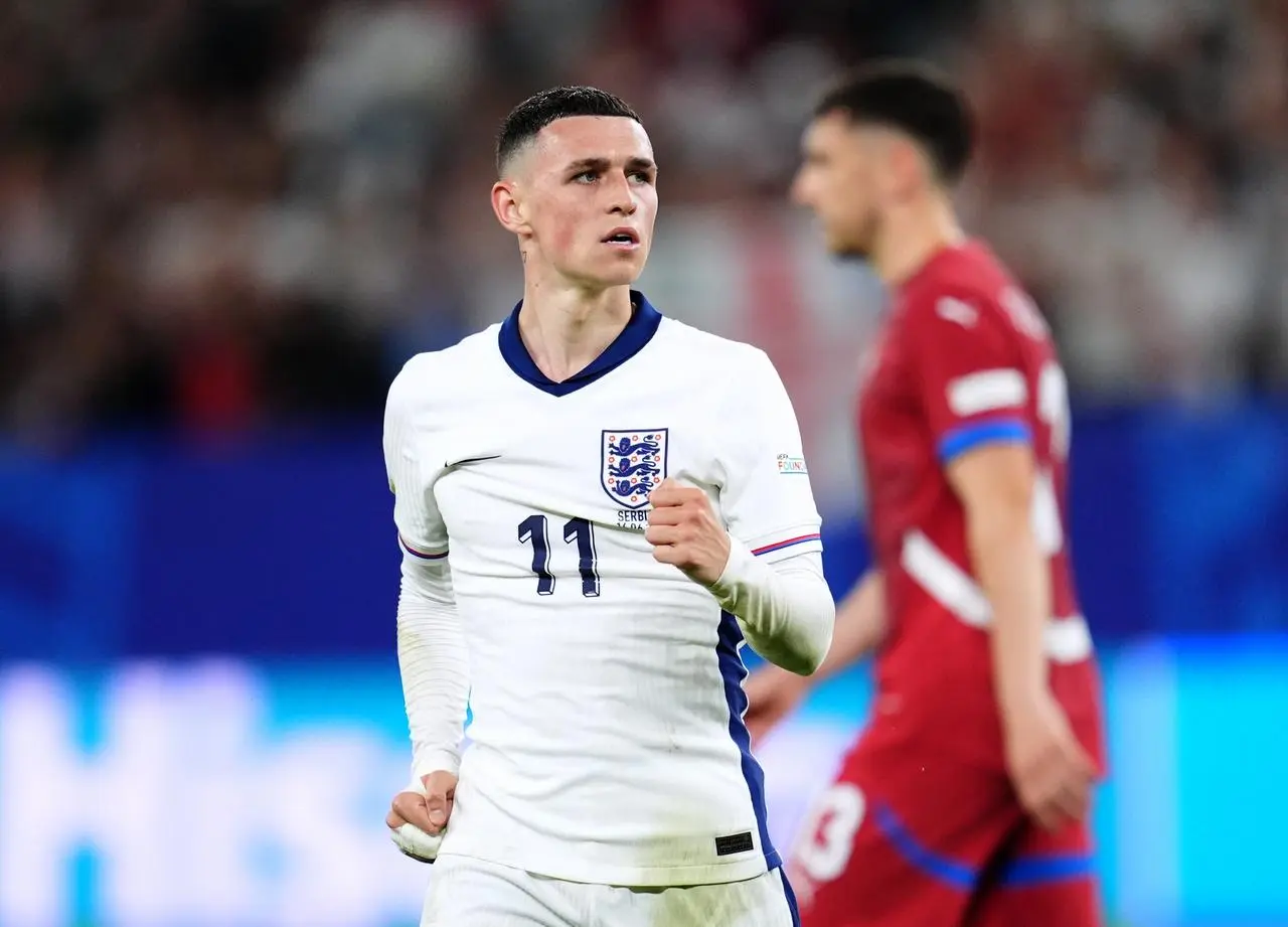 England’s Phil Foden celebrates at the end of the UEFA Euro 2024 Group C match at the Arena AufSchalke in Gelsenkirchen