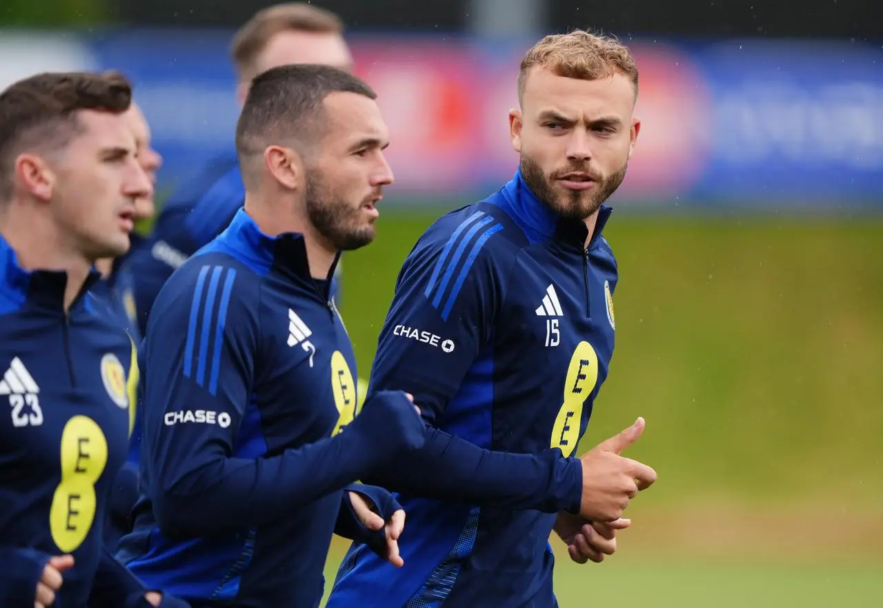 Ryan Porteous (right) trains with his Scotland team-mates