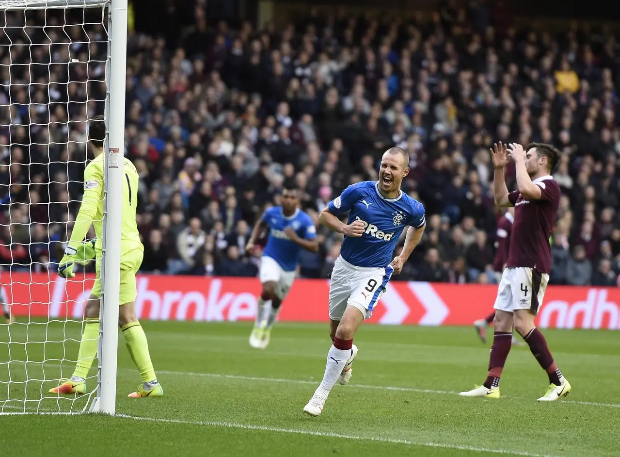 Kenny Miller scores for Rangers against Hearts at Murrayfield