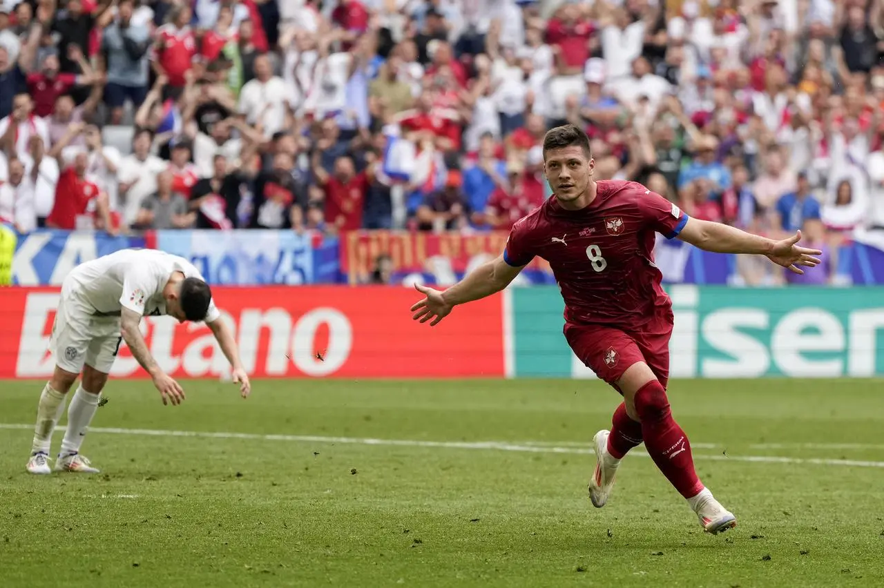 Serbia’s Luka Jovic celebrates after scoring his side's equaliser against Slovenia