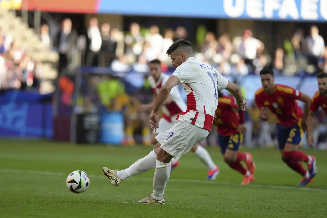 Bruno Petkovic takes aim from the penalty spot during Croatia's defeat to Spain at Euro 2024