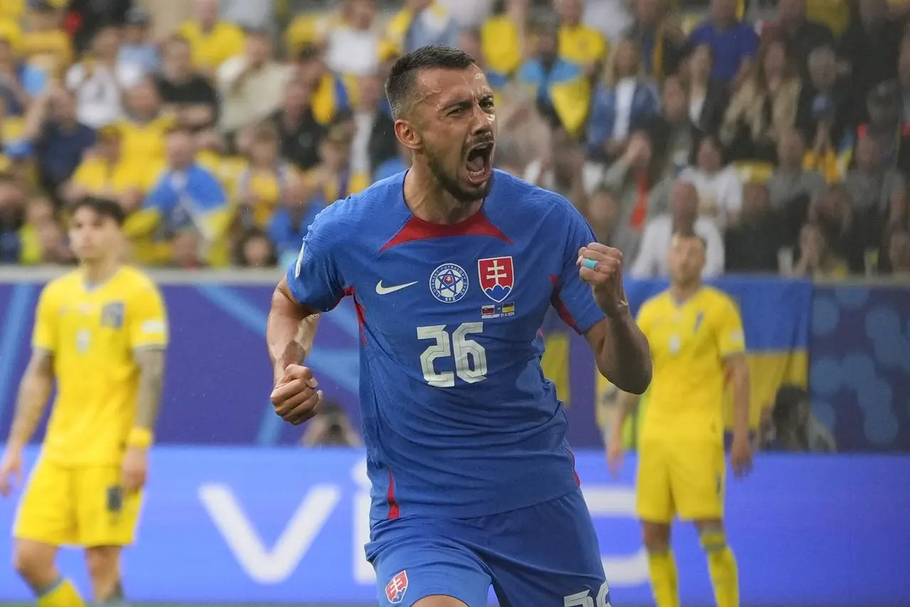 Ivan Schranz celebrates after scoring his Slovakia's opening goal against Ukraine