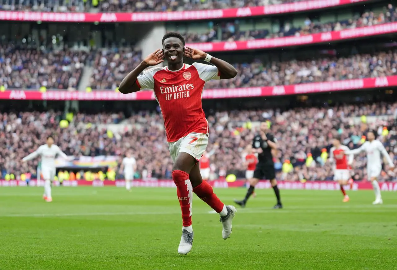 Arsenal’s Bukayo Saka scoring away to Tottenham