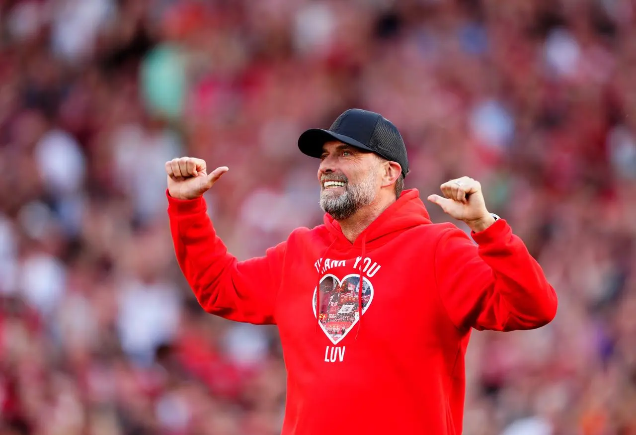 Jurgen Klopp gestures to the crowd on his farewell appearance as Liverpool manager