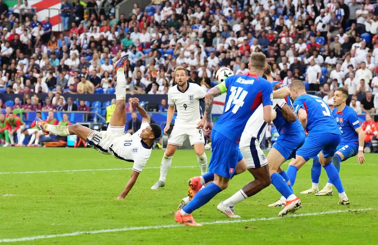 England’s Jude Bellingham scores their equaliser against Slovakia