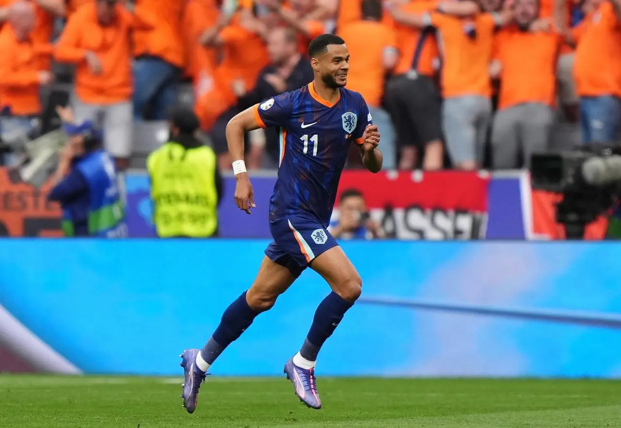 The Netherlands' Cody Gakpo celebrates scoring their first goal of the game during the Euro 2024 last-16 match against Romania 