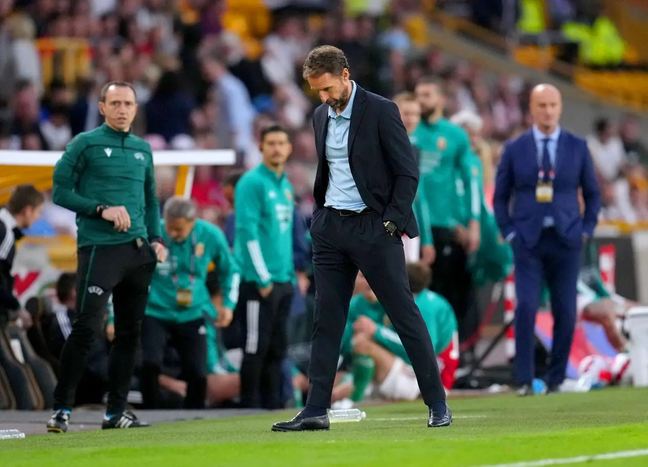 England manager Gareth Southgate looks to the ground as he appears dejected in his technical area during the Nations League game with Hungary