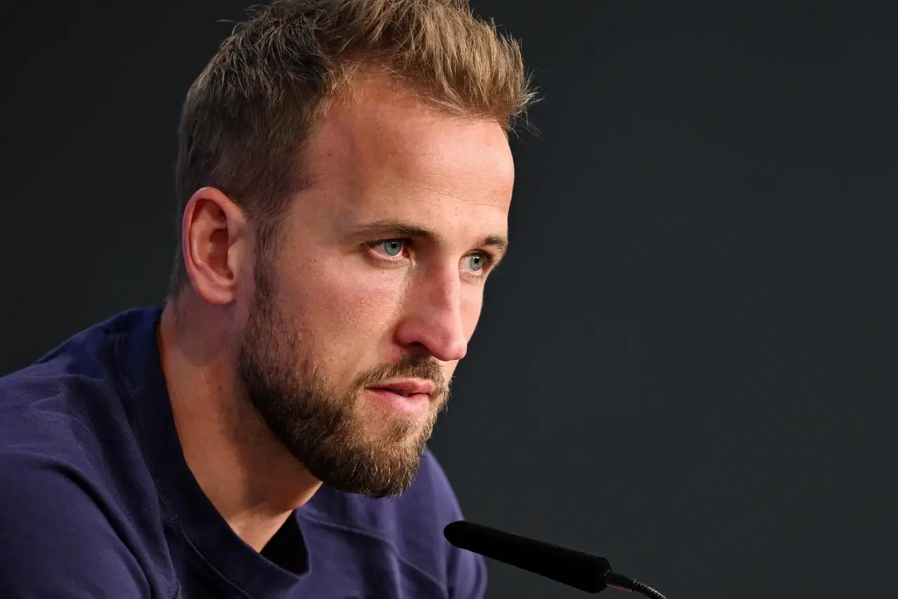 Harry Kane speaks to a press conference 