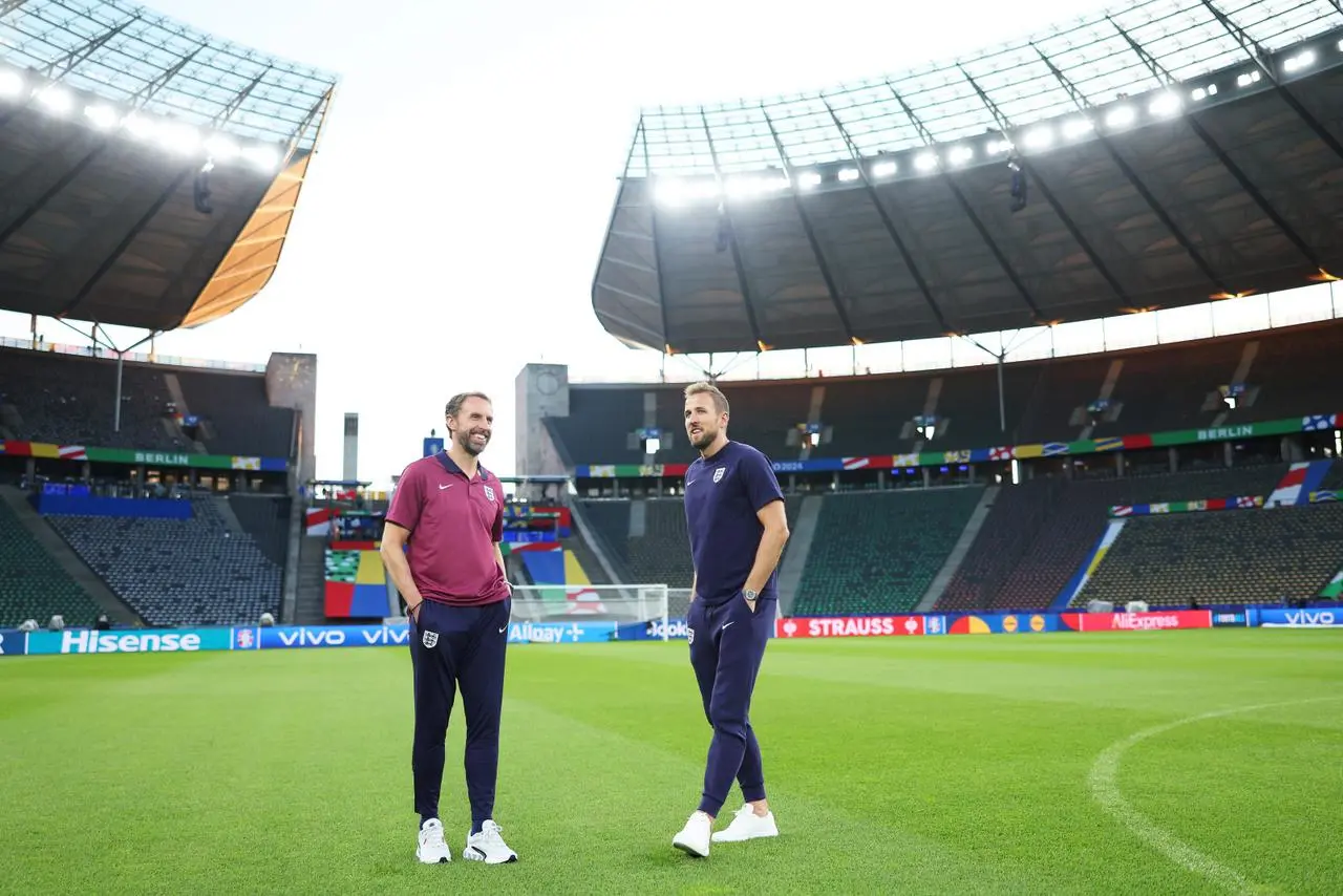 Gareth Southgate and Harry Kane survey the arena at the Olympiastadion 