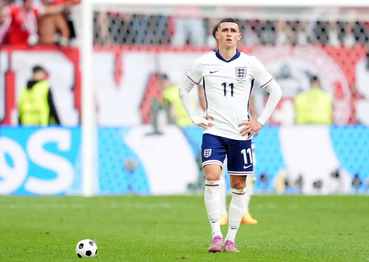 England's Phil Foden stands with his hands on his hips during the Euro 2024 quarter-final against Switzerland