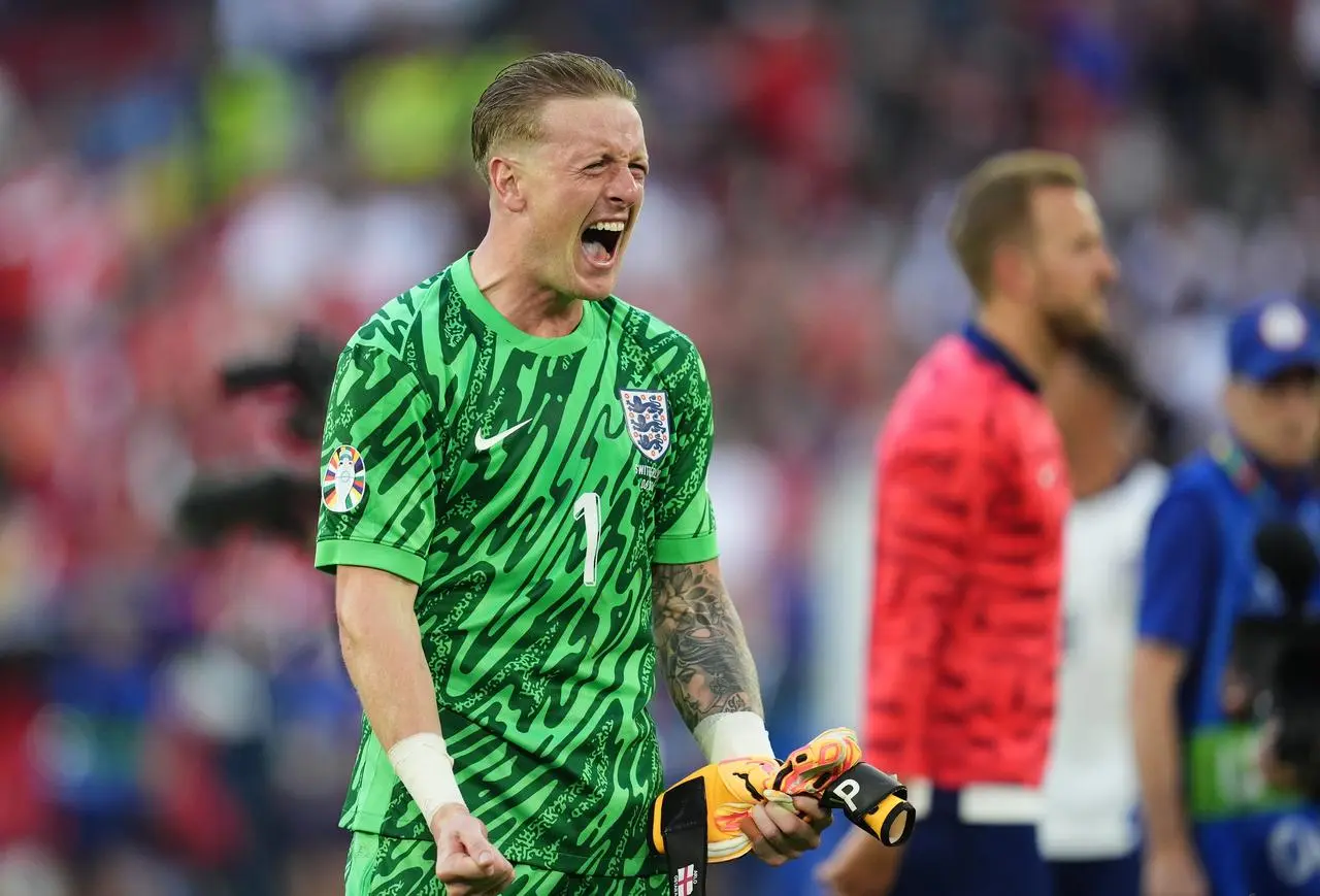 Jordan Pickford celebrates following the shoot-out win