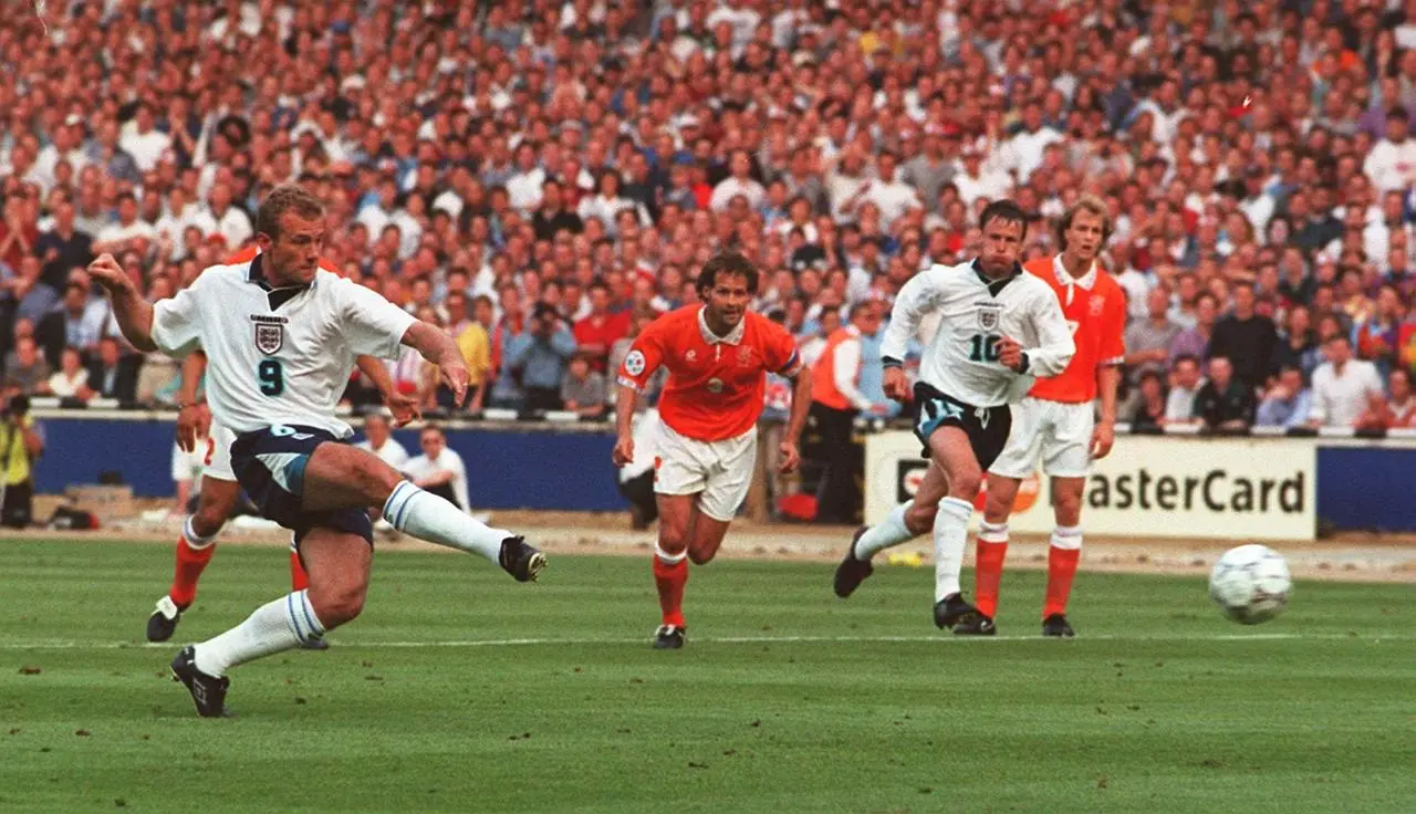 Alan Shearer scores from a penalty to open the scoring for England against the Netherlands 