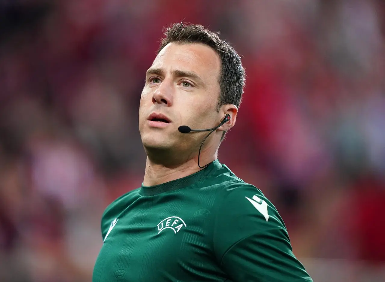 Referee Felix Zwayer warming up before the UEFA Europa Conference League semi-final, second leg match between Olympiacos and Aston Villa