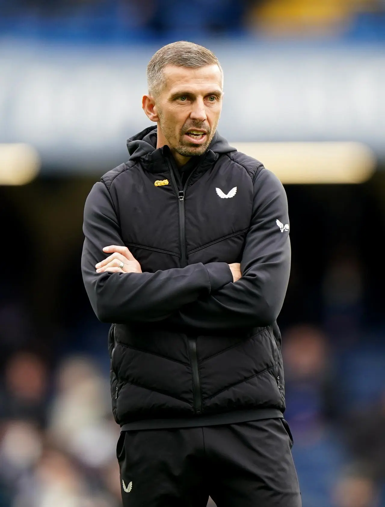 Wolves manager Gary O’Neil stands with his arms folded