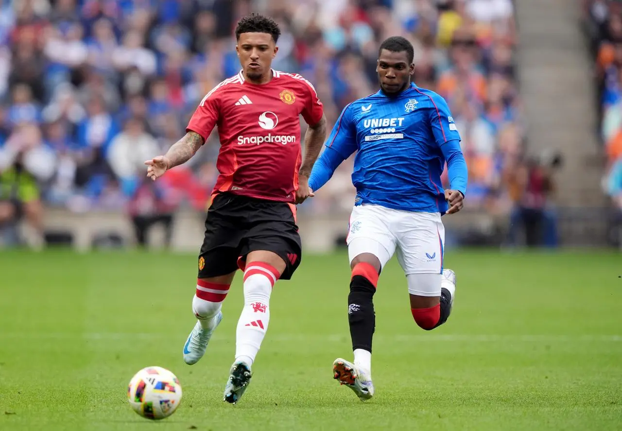 Dujon Sterling chases Jadon Sancho