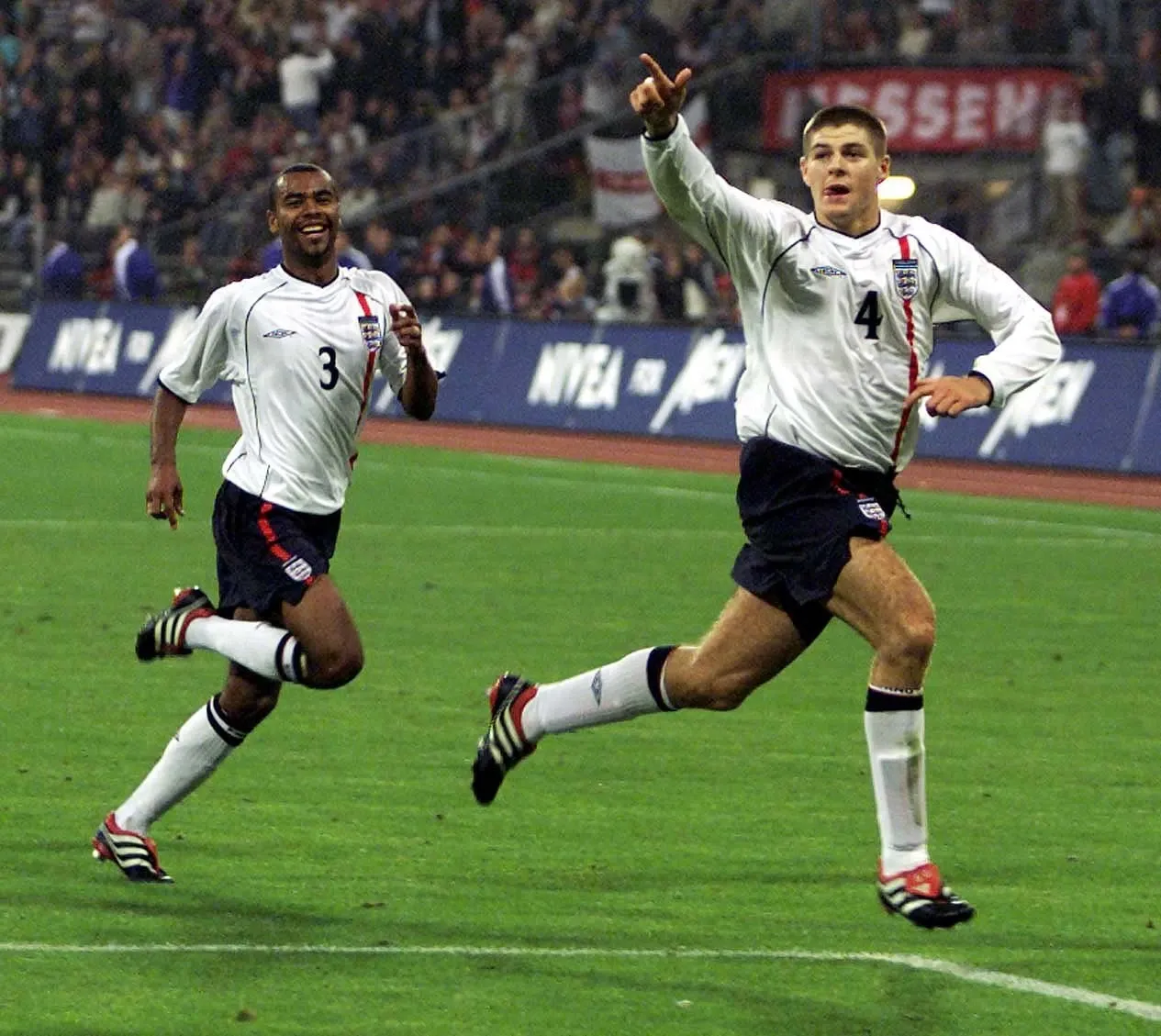 Steven Gerrard points towards the England fans as he celebrates a goal against Germany