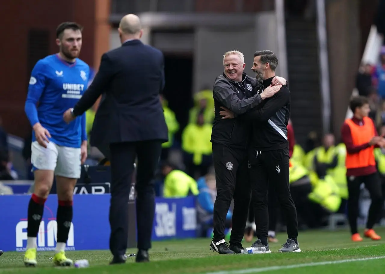 Motherwell manager Stuart Kettlewell (right) celebrates following a win at Ibrox