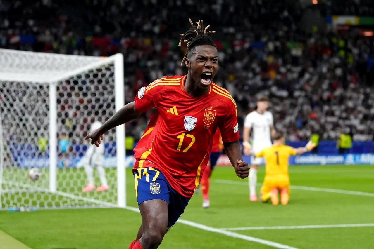 Spain's Nico Williams celebrates after opening the scoring against England in the Euro 2024 final