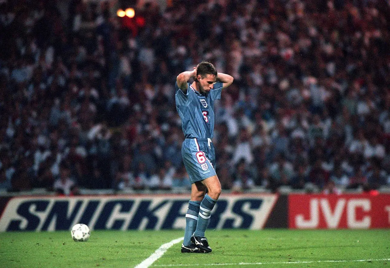 Gareth Southgate reacts after his penalty shoot-out miss against Germany at Euro 96