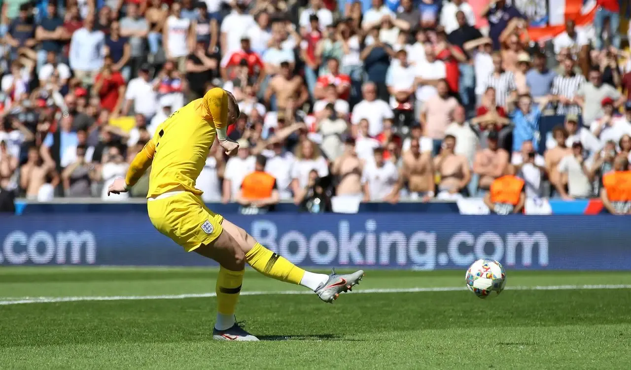 England goalkeeper Jordan Pickford scores a shoot-out penalty against Switzerland in the Nations League third place play-off in 2019