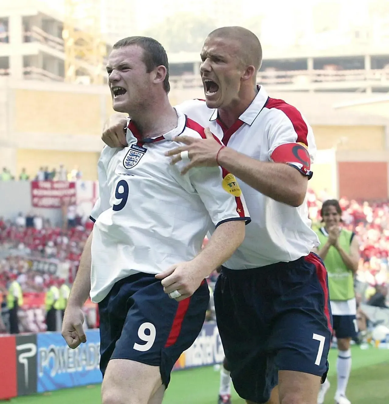 England’s Wayne Rooney, left, celebrates with David Beckham after scoring against Switzerland at Euro 2004