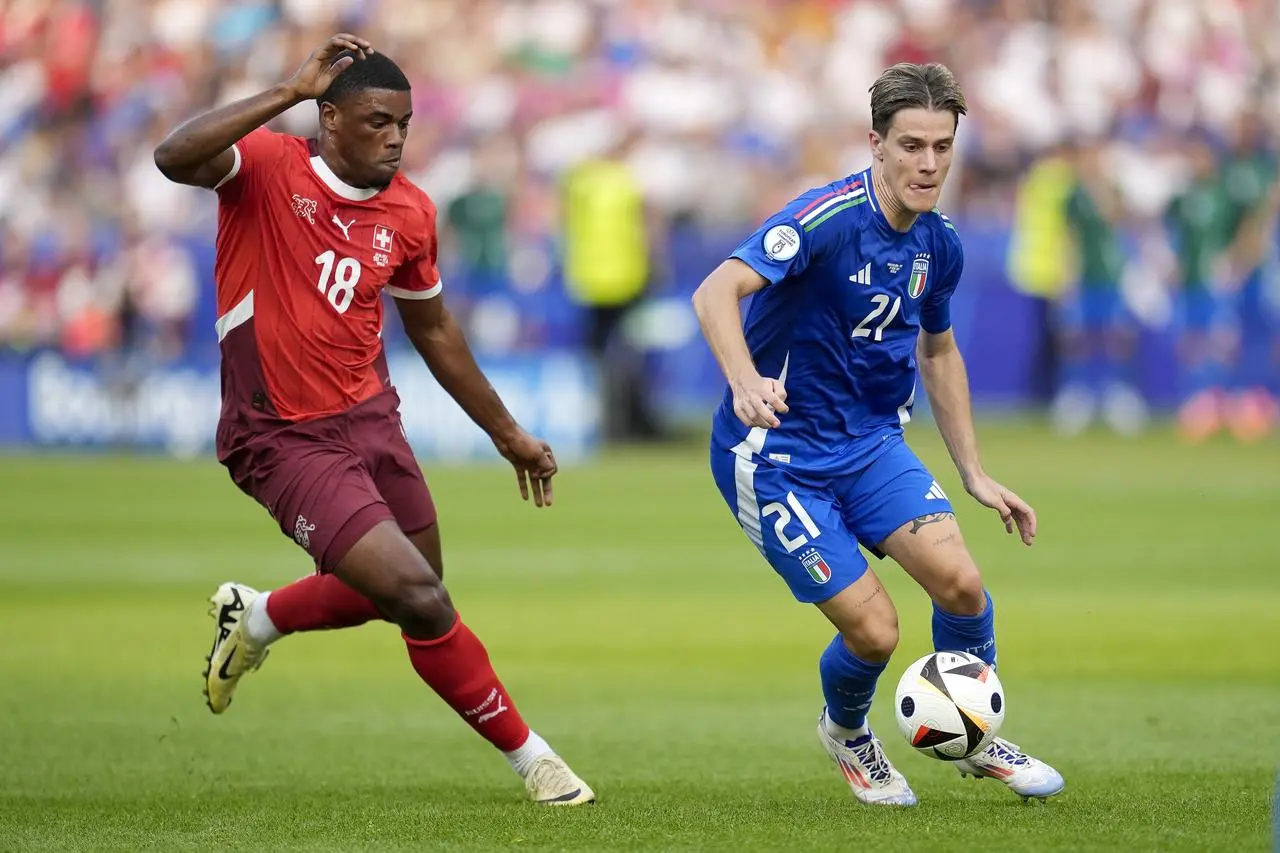 Switzerland’s Kwadwo Duah (left) in action against Italy at Euro 2024
