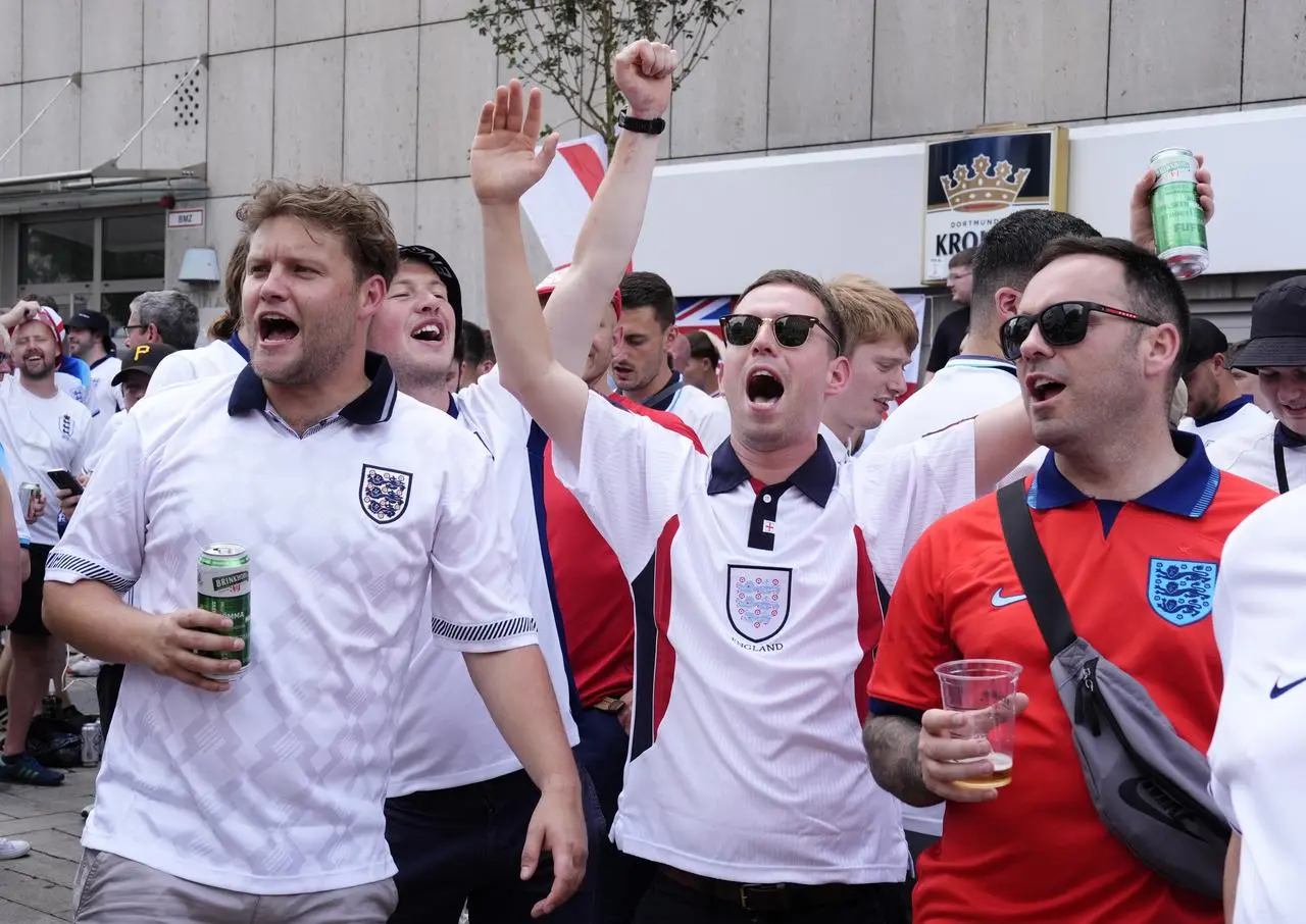 England fans mingle with Dutch supporters before the Euro 2024 semi-final in Dortmund