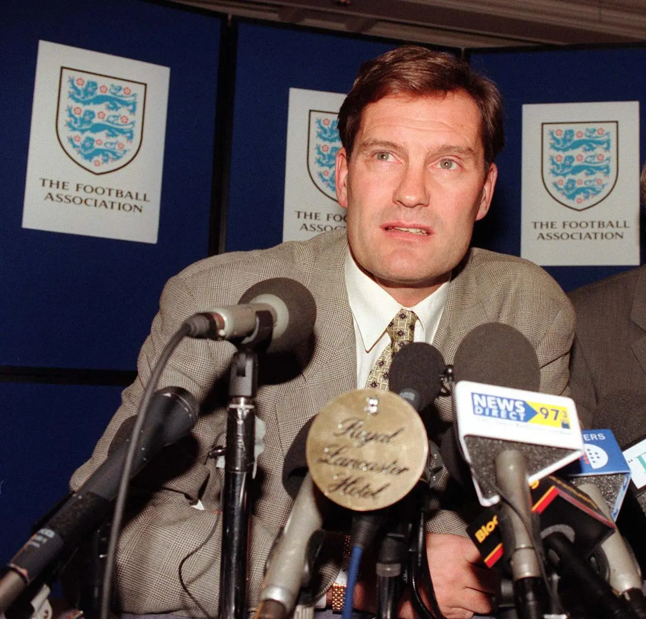 Glenn Hoddle speaking at a news conference