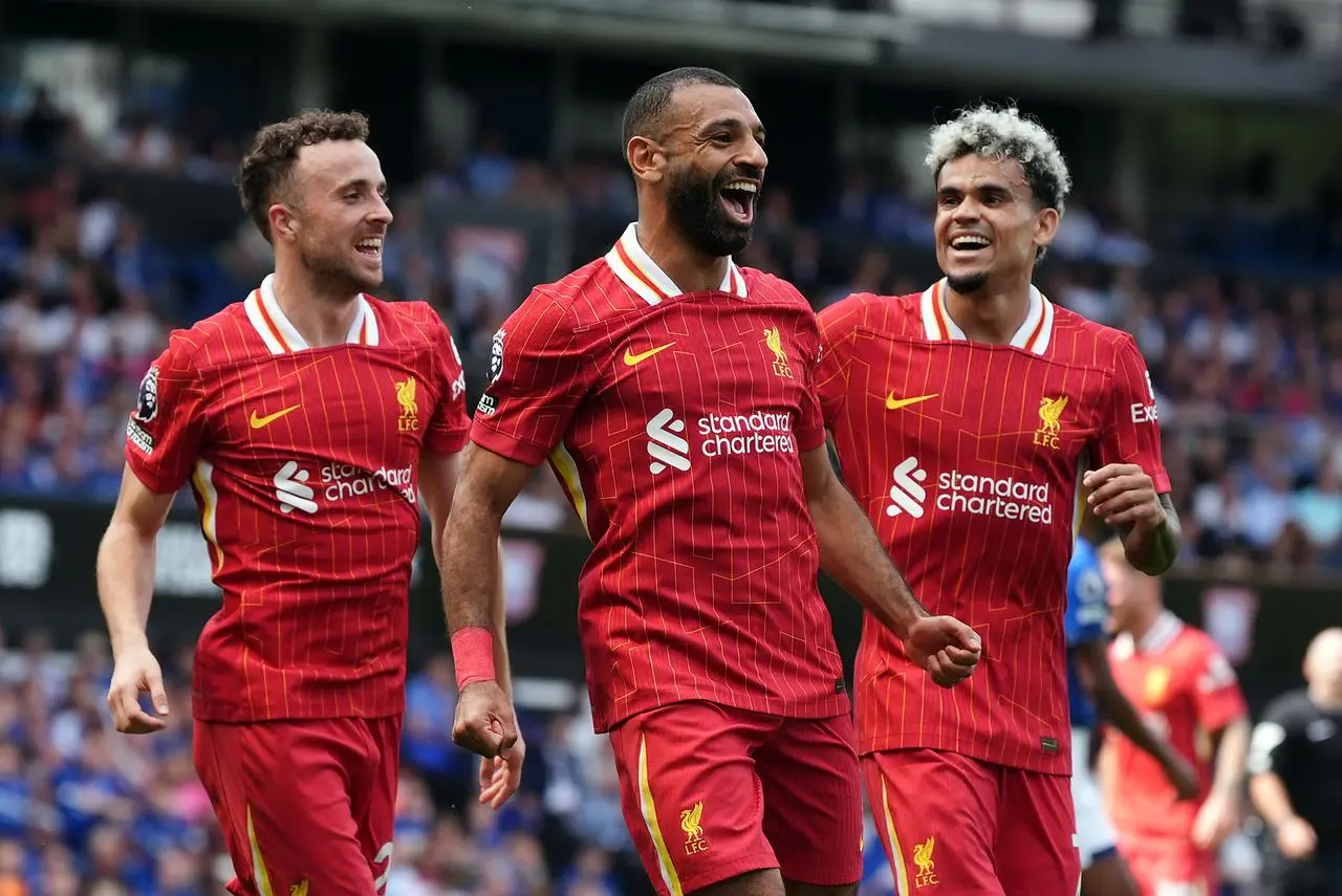 Mohamed Salah celebrates scoring for Liverpool with Luis Diaz and Diogo Jota