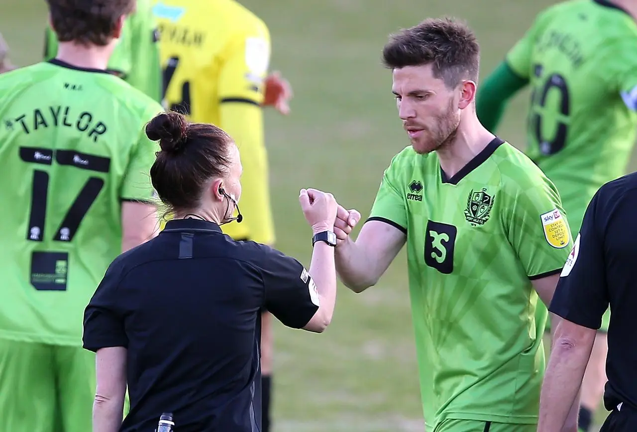 Rebecca Welch is congratulated by Port Vale’s Shaun Brisley after she became the EFL's first female referee at Harrogate in 2021