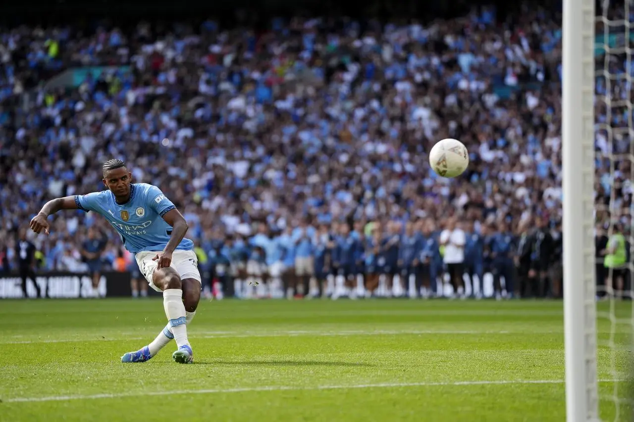 Manuel Akanji scores the winning penalty in last week's Community Shield clash with Manchester United