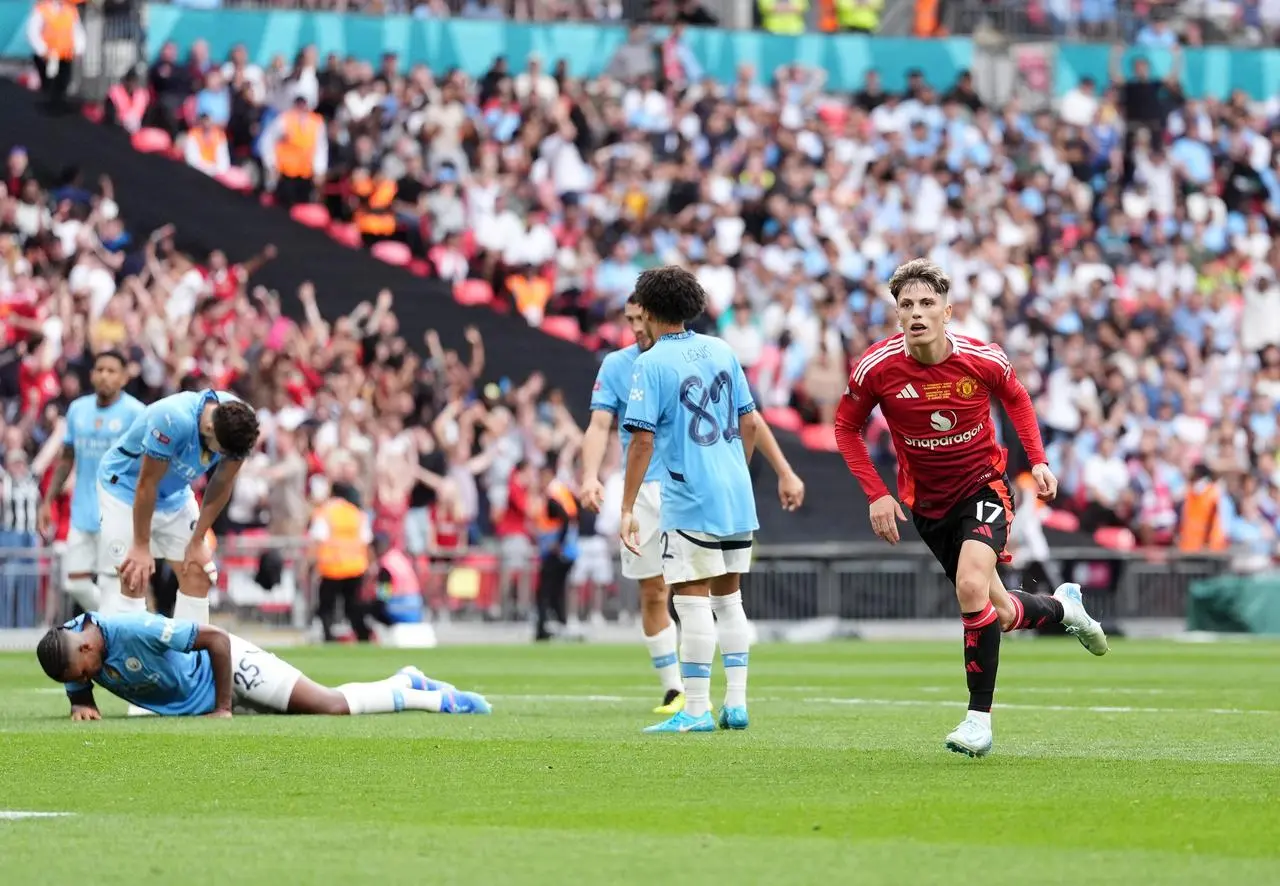 Manchester United’s Alejandro Garnacho celebrates scoring by running awat