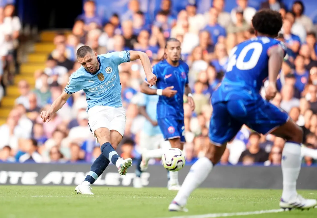 Mateo Kovacic scores Manchester City's second goal against Chelsea