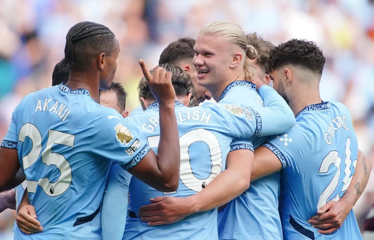 Erling Haaland, centre right, celebrates with team-mates after scoring Manchester City’s fourth goal against Ipswich