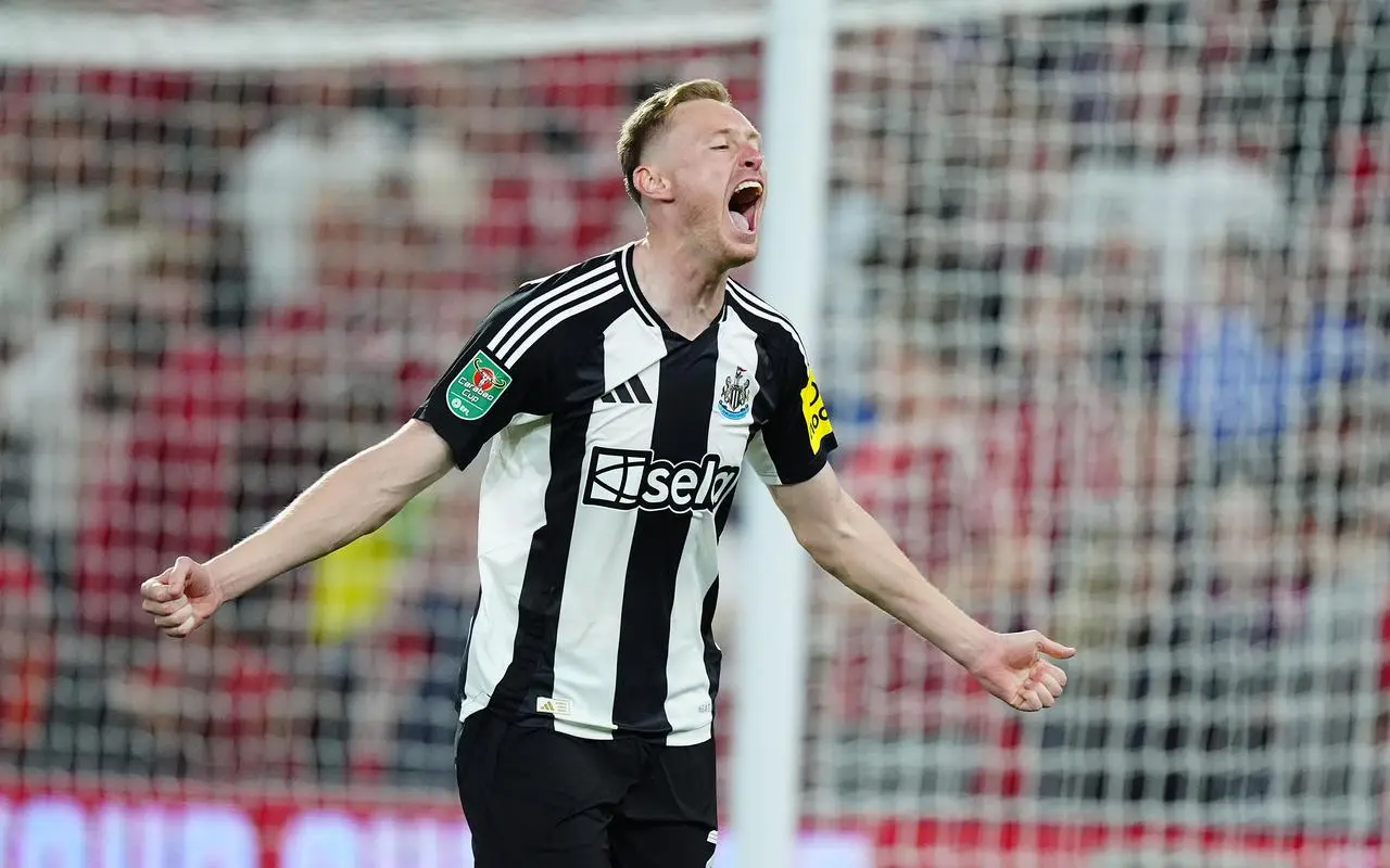 Sean Longstaff celebrates the winning penalty