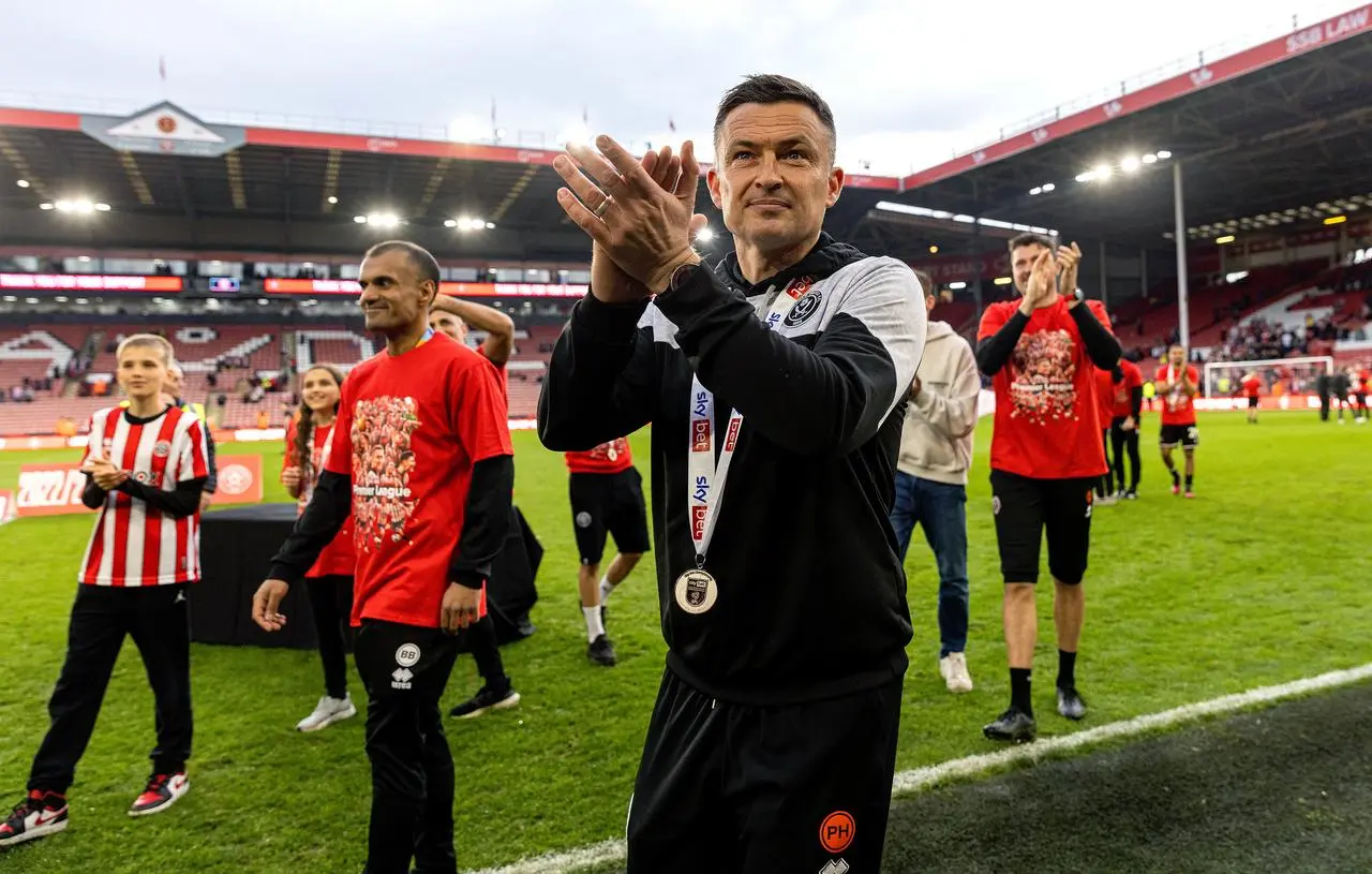 Sheffield United boss Paul Heckingbottom applauds the fans at Bramall Lane