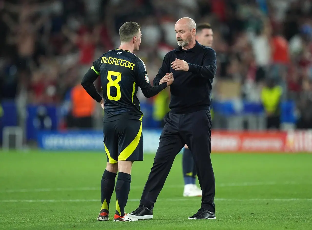 Callum McGregor and Steve Clarke shake hands