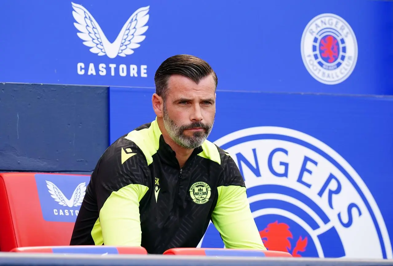 Stuart Kettlewell sits in the Hampden bench